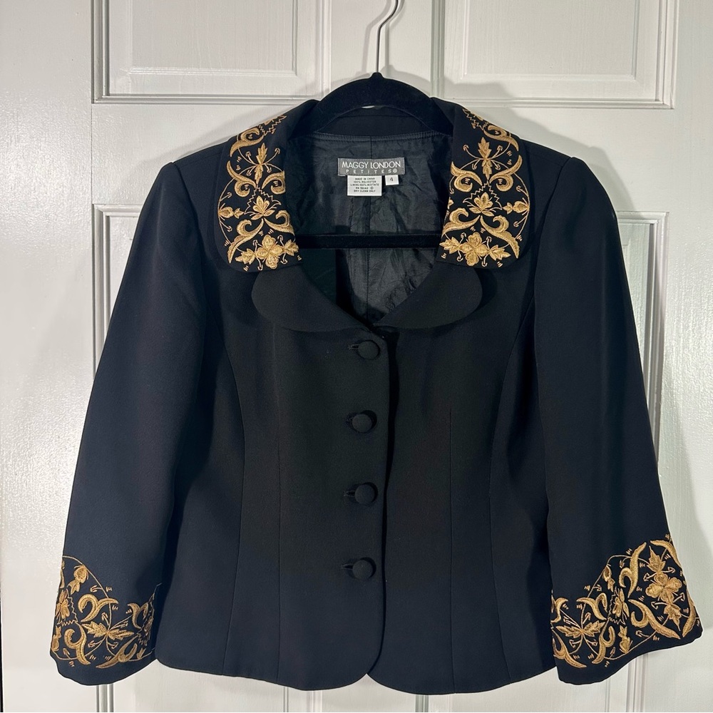 Black small jacket, Unwrinkled fabric, with gold embroidery that looks great